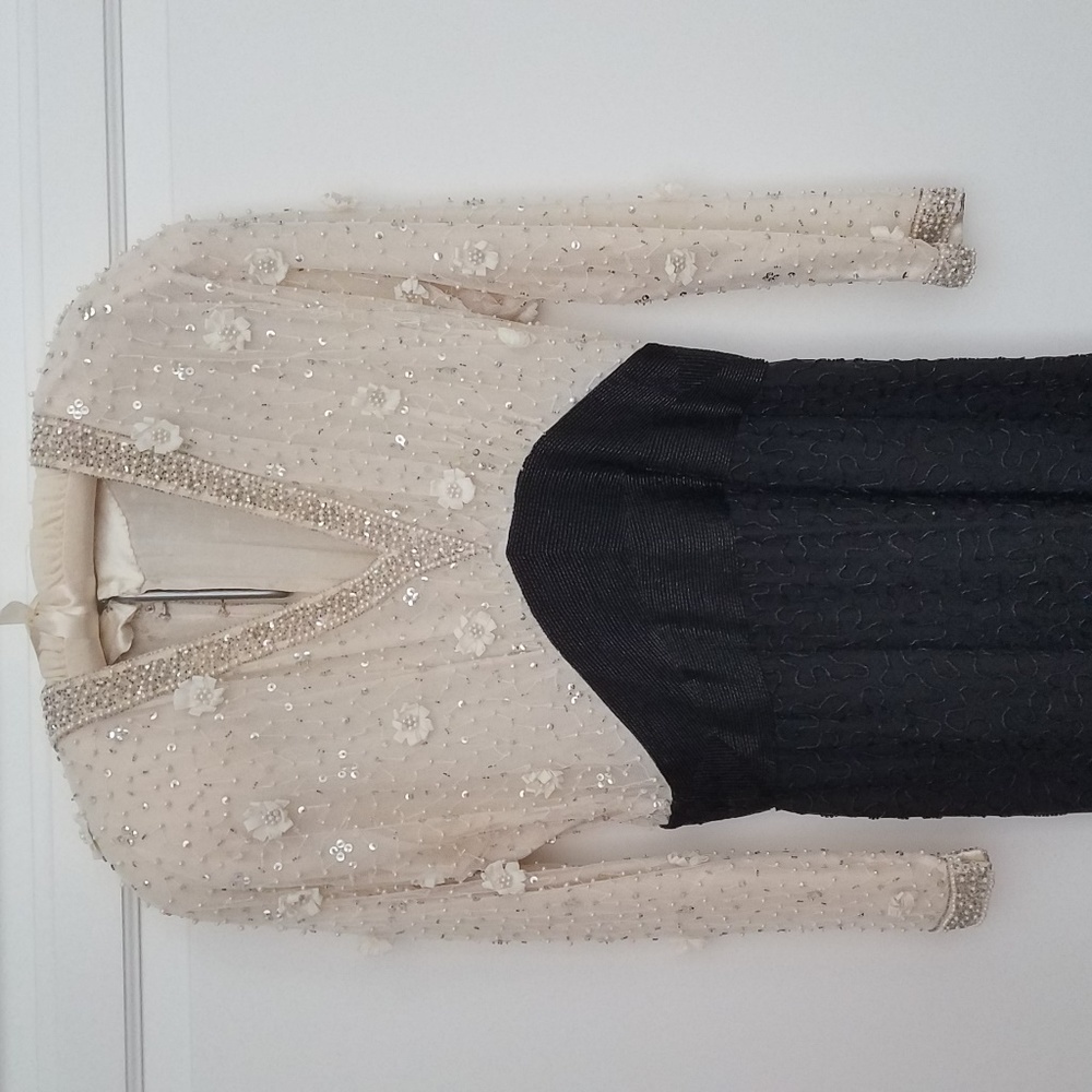 Hand beaded evening dress.